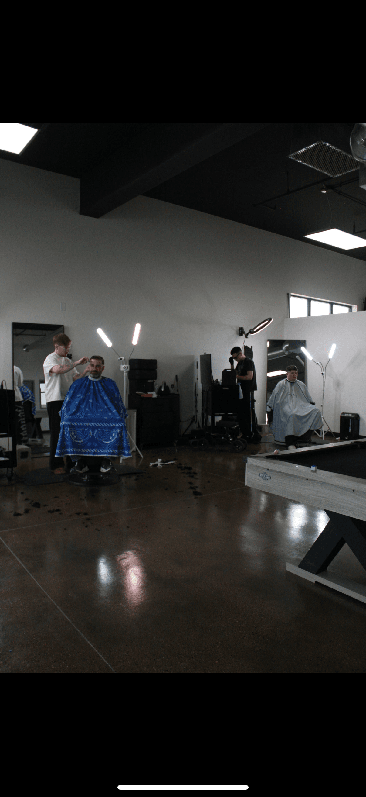 Gani Barbershop waiting area and chairs