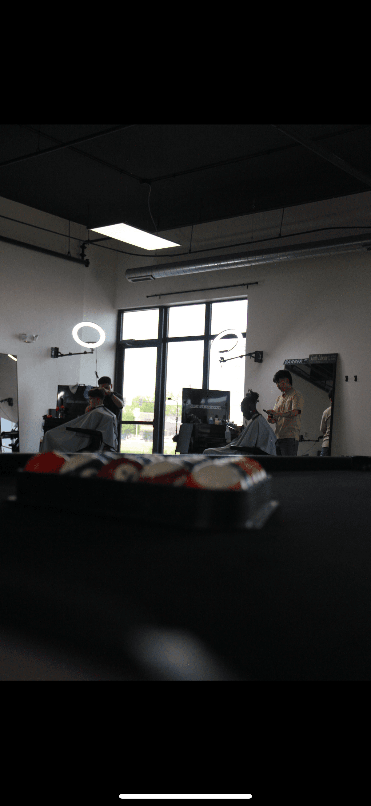 Gani Barbershop interior view from counter